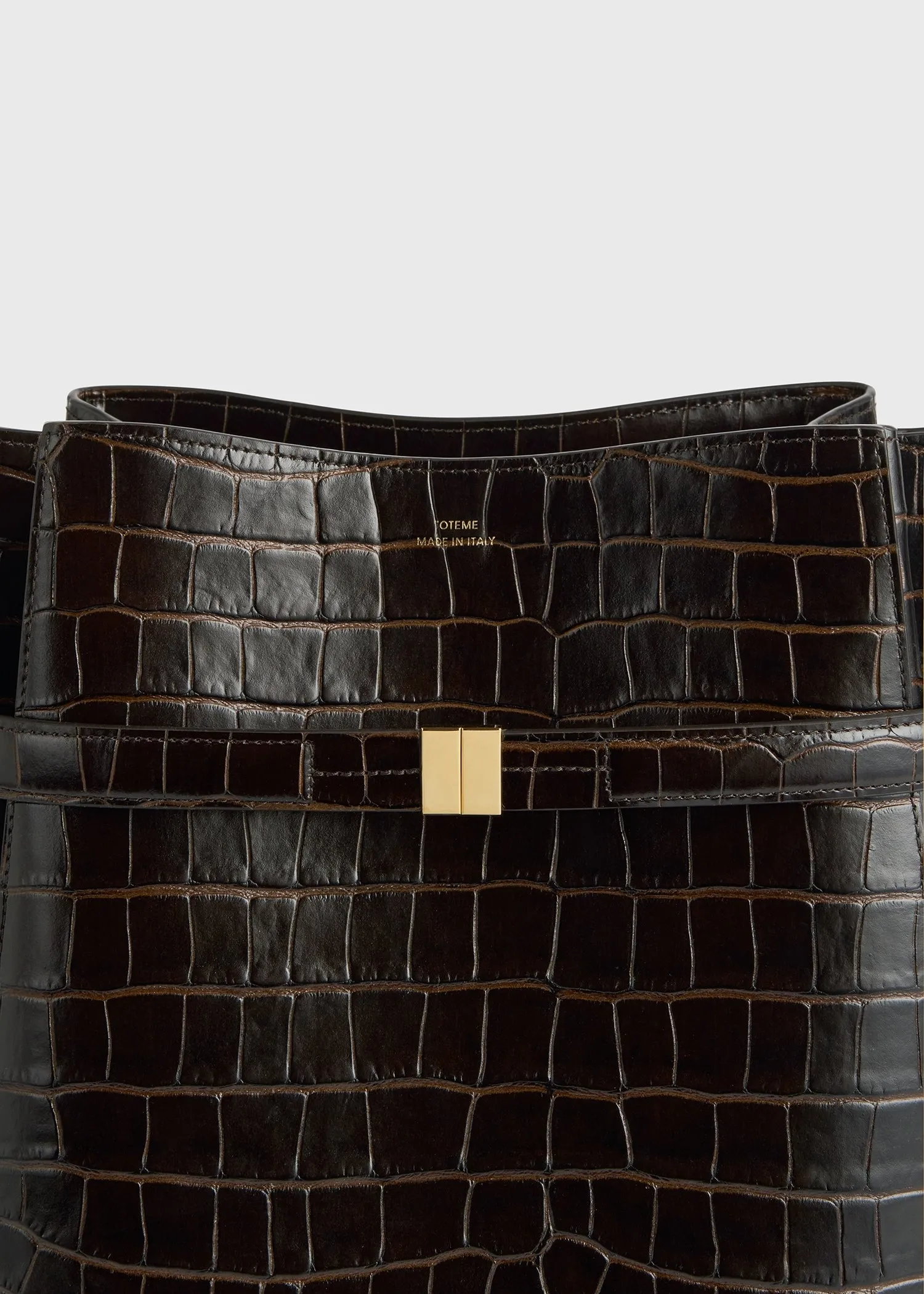 Belted croco-embossed bucket bag dark brown