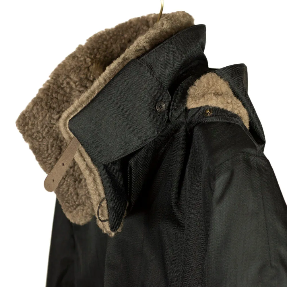 Black herringbone Moscow raincoat with shearling collar and Arctic padded lining